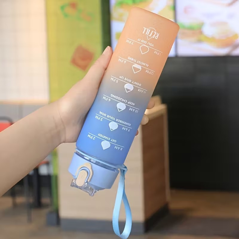 زجاجة مياه رياضية سعة 900 مل م - مراجعة Smart Water Bottle Tracker وسعره